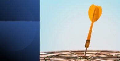 SMART Goals framework visual showing a dart hitting the target to represent focused goal achievement.