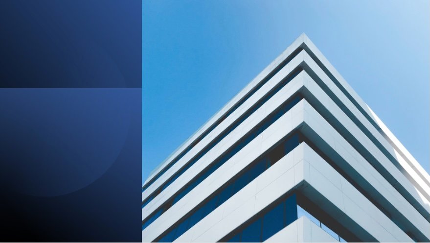 Modern office building against clear sky, symbolizing structure, confidence, and strong first impressions in communication.