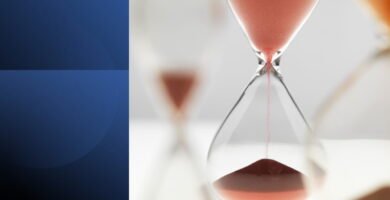 Hourglass symbolizing time leverage and mastering time for persuasive success.