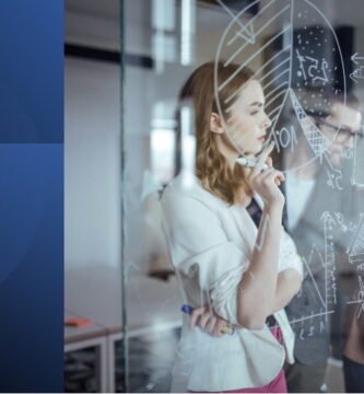 Professional woman analyzing data and strategy while selling her potential with confidence.